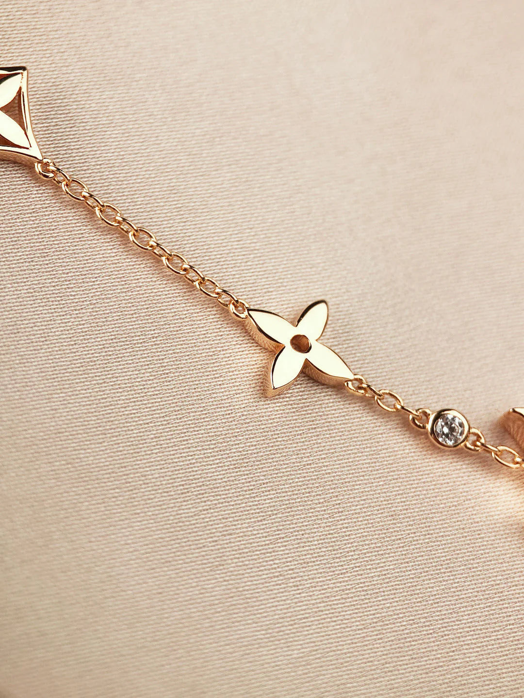 Star and Sun 7 Motifs Gold Bracelet