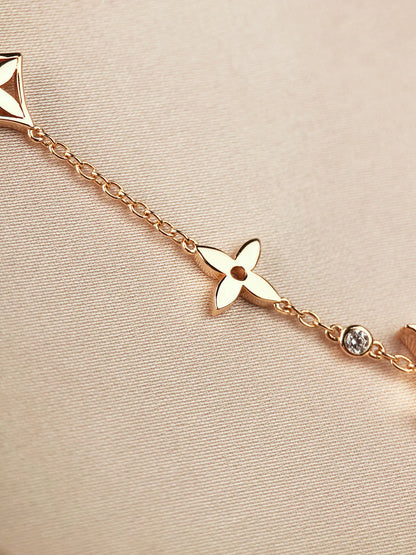 Star and Sun 7 Motifs Gold Bracelet