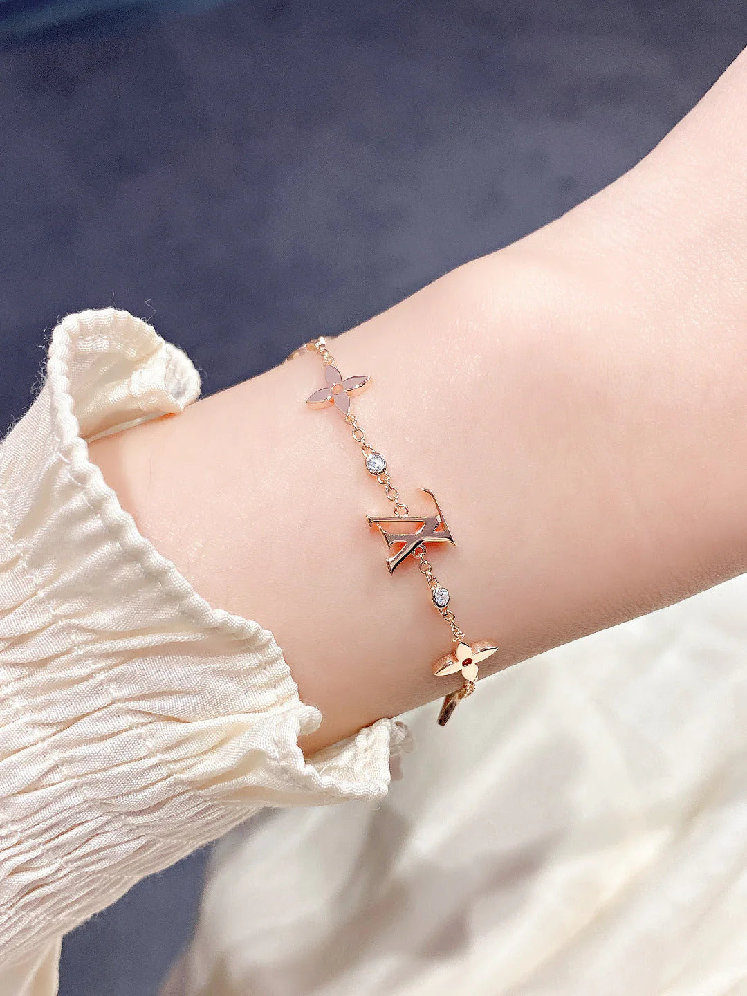 Star and Sun 7 Motifs Gold Bracelet