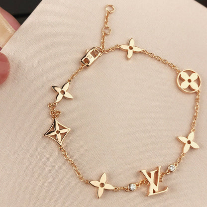 Star and Sun 7 Motifs Gold Bracelet