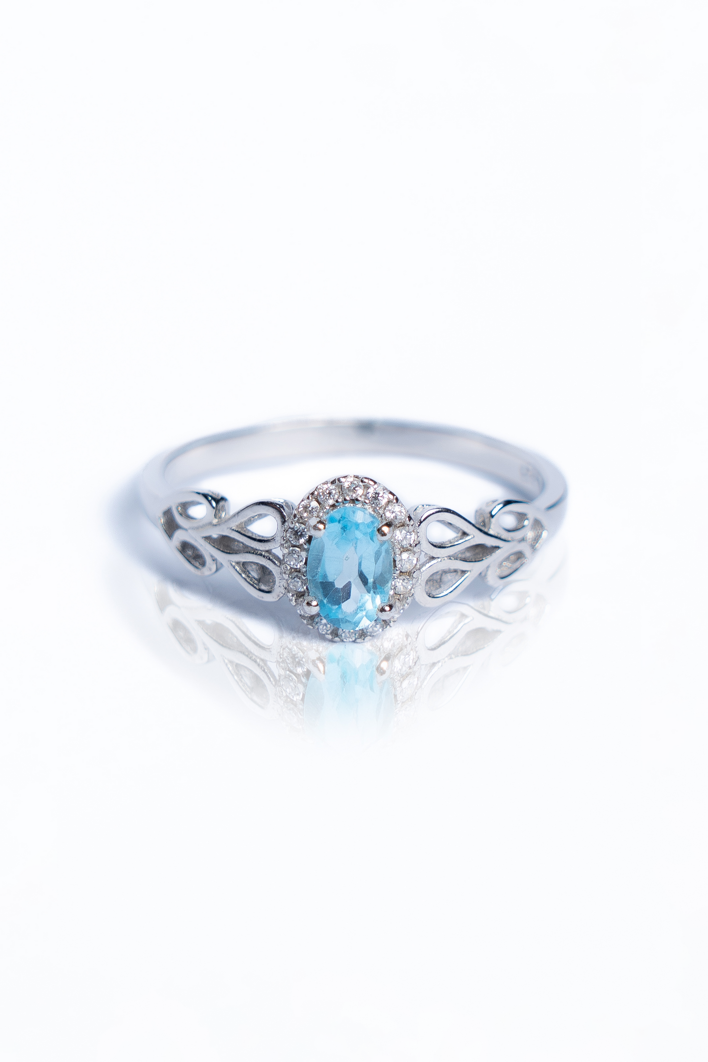 Blue Topaz And Zircon Ring