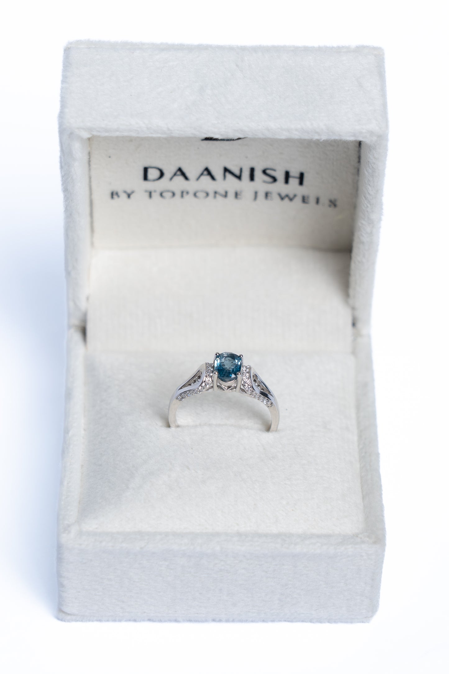 Blue Topaz And Zircon Curve Ring