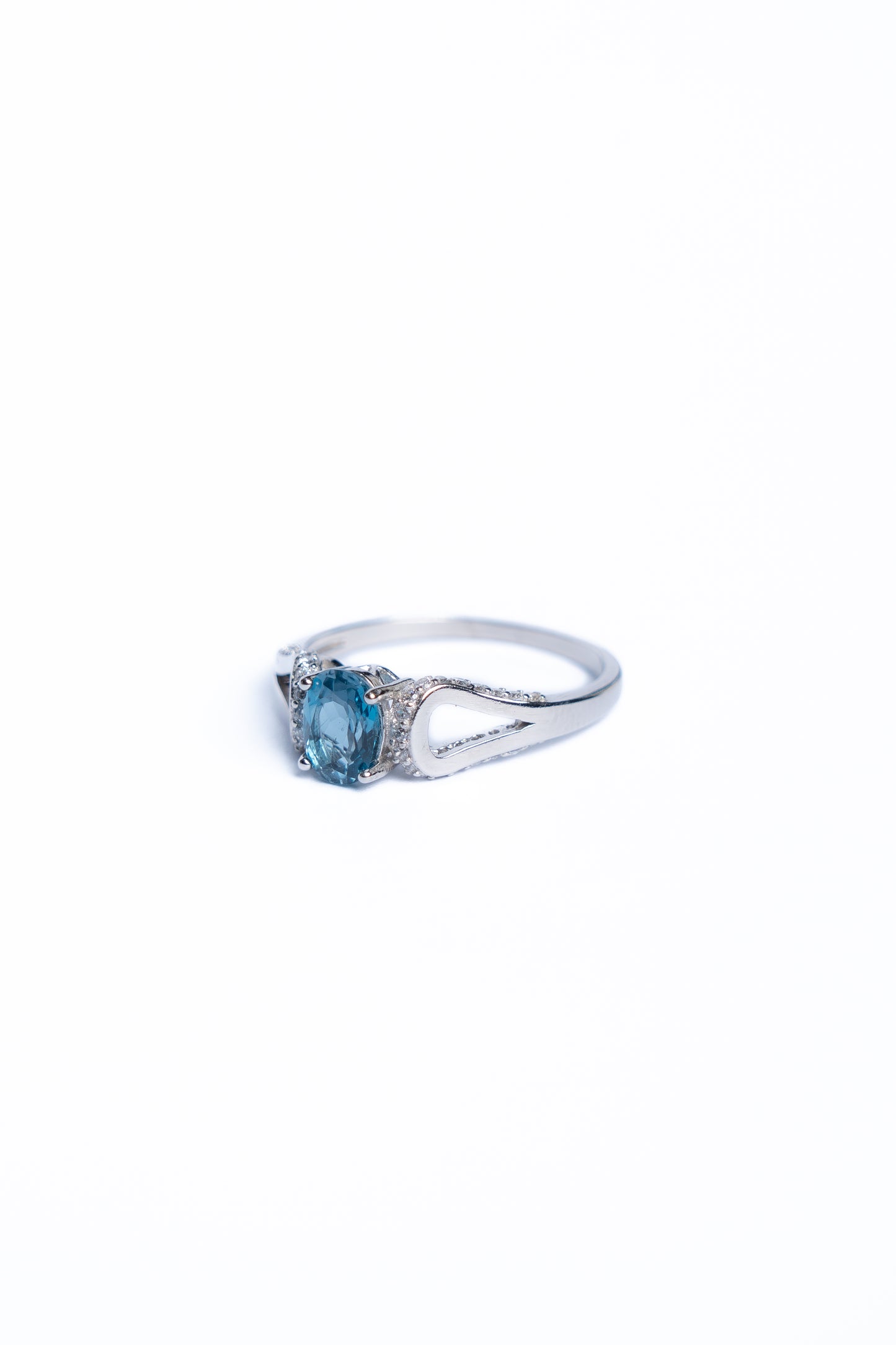 Blue Topaz And Zircon Curve Ring