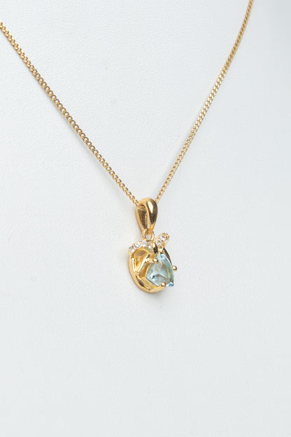 Blue Topaz Bow Pendant